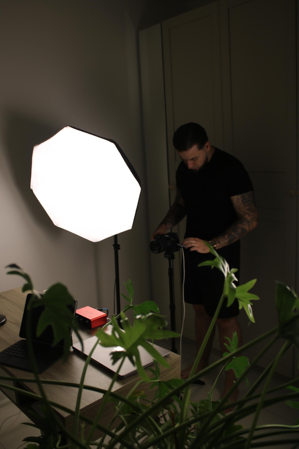 Daniel setting up a camera and light